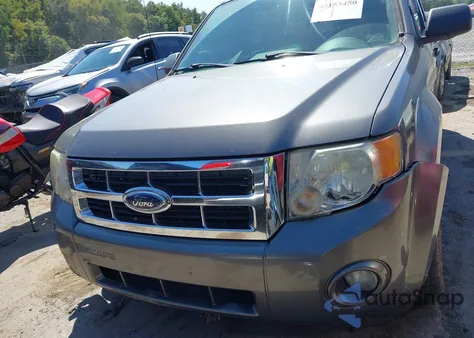 2009 Ford Escape Xlt z USA, uszkodzony, nr VIN 1FMCU93799KA86713